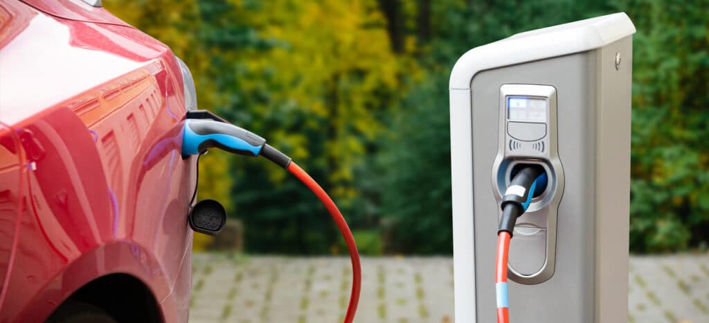 Close up of an at-home electric vehicle charging station.