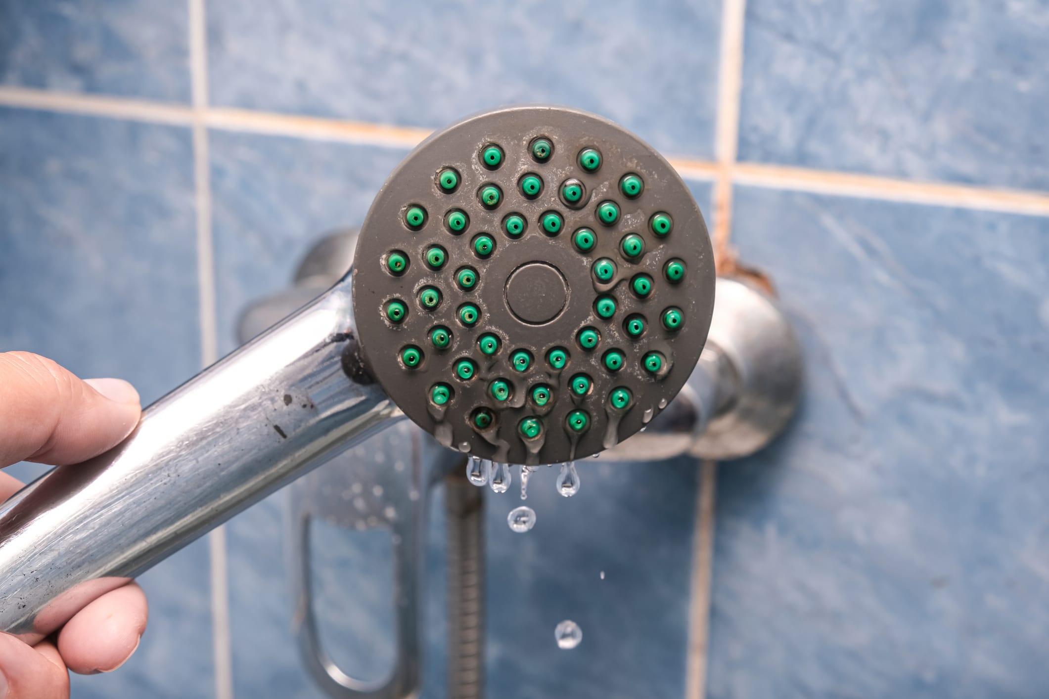 How To Clean A Shower Head: Eliminate Mineral Deposits